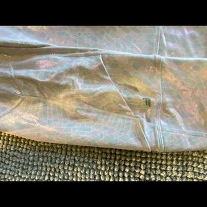 Pureluxe made by fabletics.  Shiny pink/grey